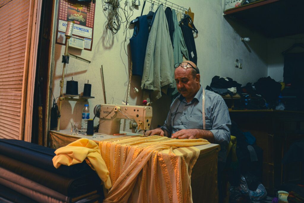 How to Find the Best Alteration Services Near Me: Your Guide to Local Tailors 1 A tailor in his workshop